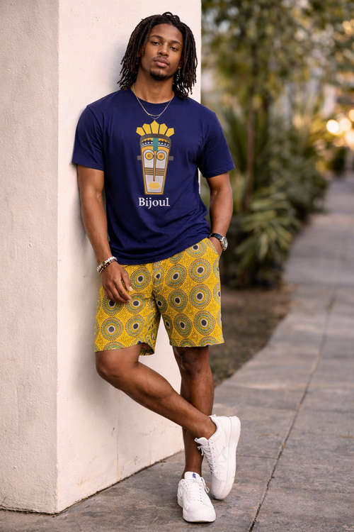 Male model wearing Bijoul Creatives ethnic graphic t-shirt with modern African print
