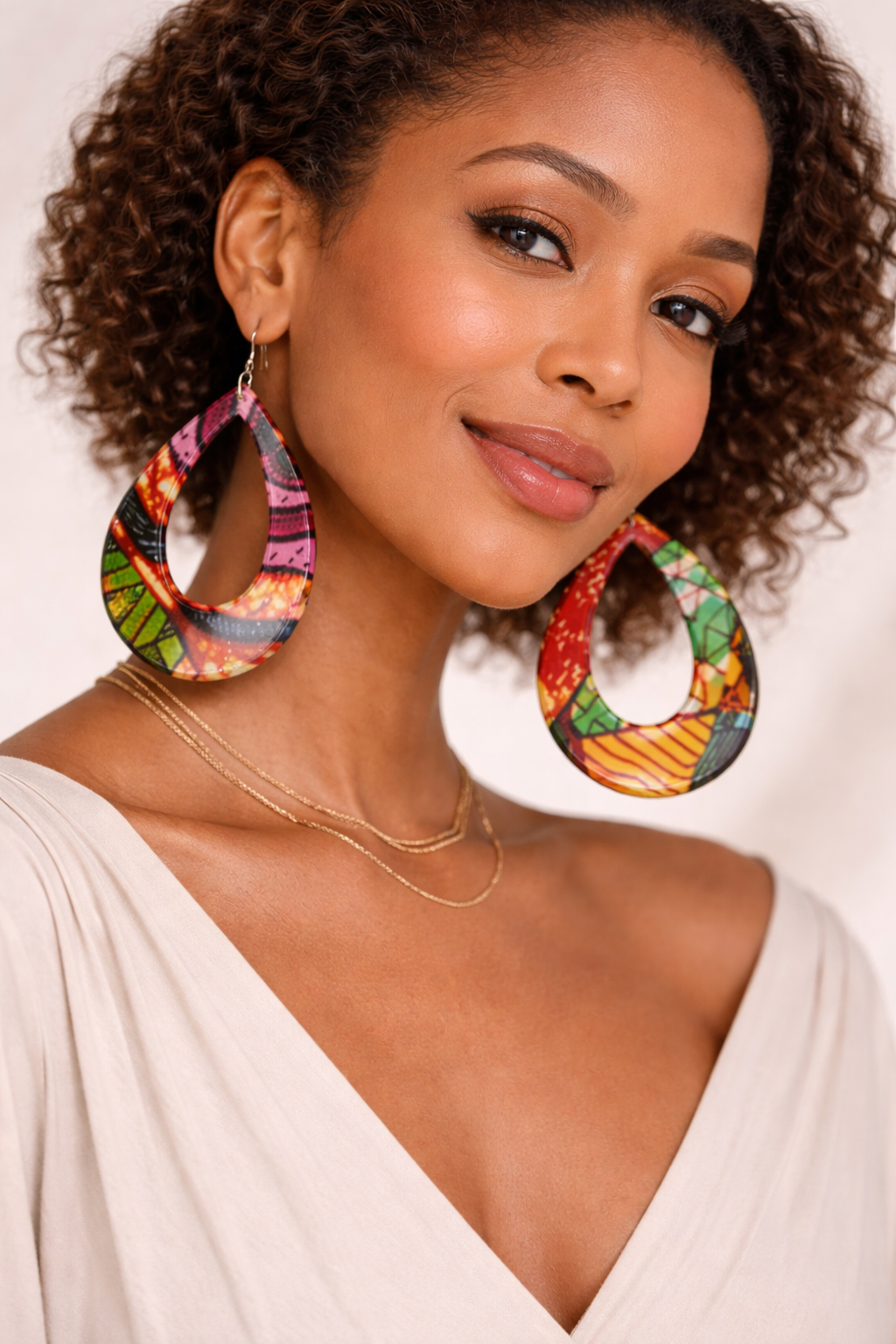 Handcrafted cultural-inspired Plexiglass statement earrings by Bijoul Creatives.