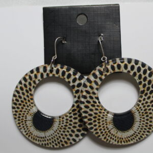 Ankara-inspired plexiglass hoop earrings in black and beige geometric pattern.